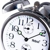 Mechanical lift alarm clock with classic bell ringer, illuminated hands