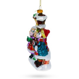 Carolers by a Vintage Lantern Blown Glass Christmas Ornament