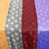 AeraVida Elegantly Stunning Hand Woven Red and Black Silk Elephant