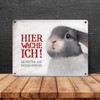 Metal Sign with Rabbit Motif and Saying "Betreten auf eigene