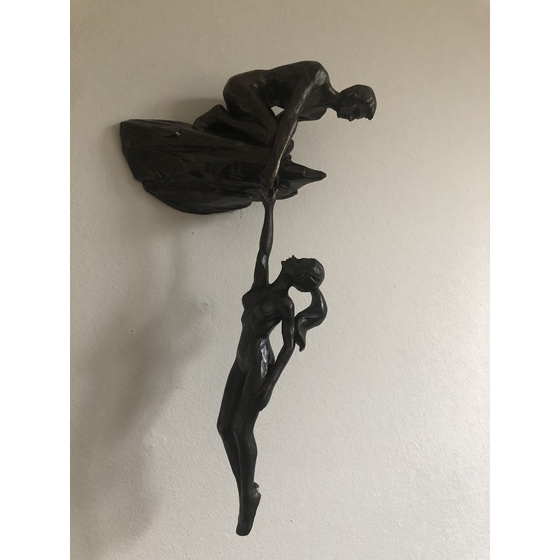 Haute Collage Man on cliff edge holding a hanging woman