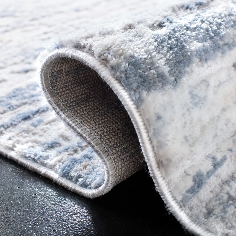 SAFAVIEH Amelia Collection Area Rug - 5'3" x 7'6", Ivory