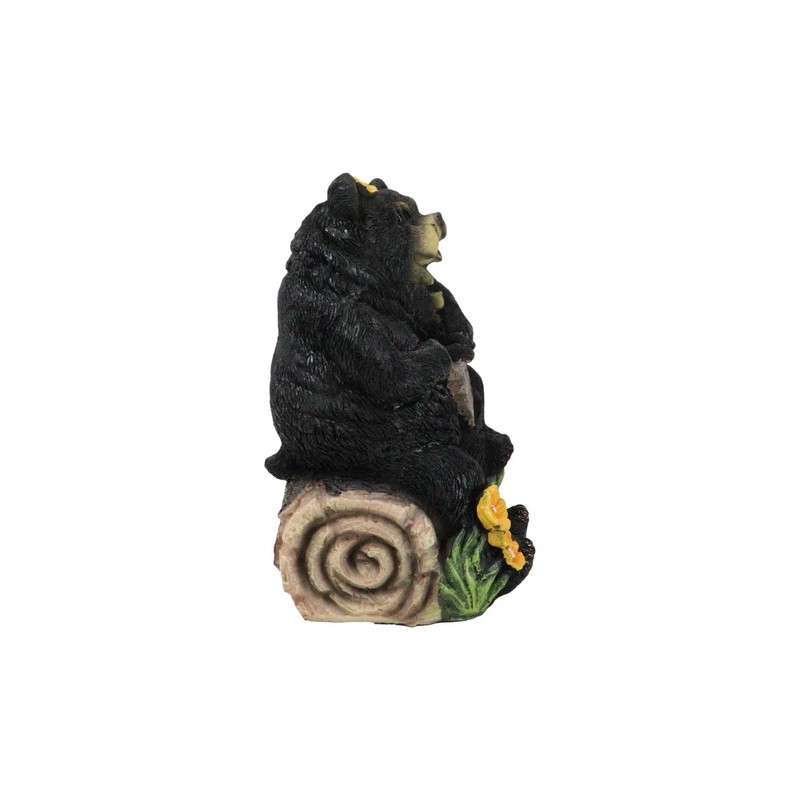 Papa Mama Black Bears and Cub Sitting On Log with