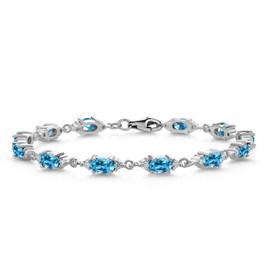 Gem Stone King 925 Sterling Silver Swiss Blue Topaz and White Moissanite Tennis Bracelet For Women (7.51 Cttw, Gemstone Birthstone, Oval 6X4MM, 6.5, 7, 7.5 Inch)