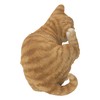 Yellow Cat Scratching Ear