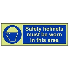 V Safety Glow In The Dark Safety Helmets Must Be Worn In This Area PPE Sign - 300mm x 100mm - Rigid Plastic