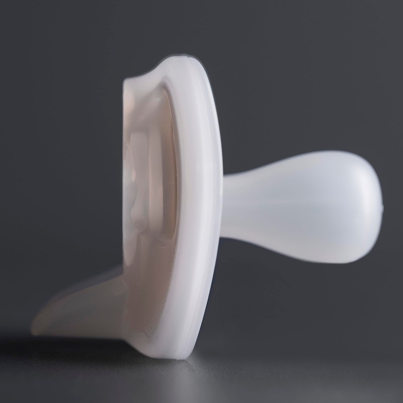 Tommee Tippee Ultra-Light Silicone Pacifier, 0-6 Months, Symmetrical One-Piece Design,