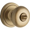 Kwikset Signature Series 97300-828 Antique Brass Juno Bed & Bath