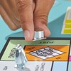 Monopoly Board Game with Storage Compartment and Larger Toy Figures