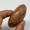 125.7g, 2.3"x2"x1.1" Natural Untreated Orange Calcite Palm-Stone Crystal Polished Gallet