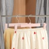 GUANJUNE Clothes Pants Hangers, Space-Saving Skirt Holders with 360 °