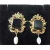 Avon 1994 Genuine Onyx goldtone steel post