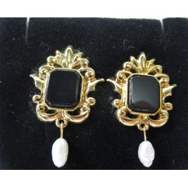 Avon 1994 Genuine Onyx goldtone steel post