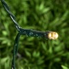 Lights4fun 100er LED Lichterkette warmweiß grünes Kabel Innen Außen mit