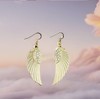 Angel Wings Earrings in a Gold Shade