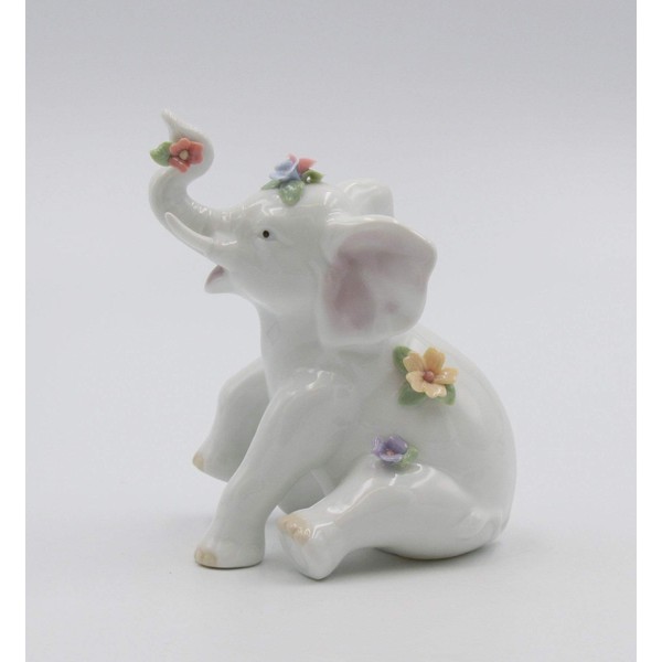 Cosmos Gifts Fine Porcelain Happy Sitting Elephant with Trunk Up with Flowers Figurine, 5-1/8" H