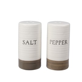Ceramic salt and pepper shaker set in country house style.