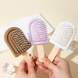 MINI DETANGLING BRUSH FOR GIRLS, KIDS & WOMEN, SOFT BRISTLES FOR CURLY & STRAIGHT HAIR, DRY WET, AIR CUSHION FOR PROTECTION & EASY TO CARRY, ICE CREAM SHAPED BRUSH A COOL DESIGN.