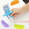 LoveInUsa Toothpaste Tube Squeezer Dispenser, Hanging Toothpaste Clips Holder Rolling