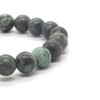 Women's bracelet in green natural turquoise beads and Tibetan beads