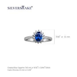 Silvershake Petite 7X5mm Created Oval Shape Blue Sapphire White Gold Plated 925 Sterling Silver Flower Cluster Business Attire Ring September Gemstone Birthstone Size 9, Sterling Silver Rhodium (White Gold Plated), created blue sapphire & white cz