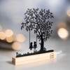 UNUS Decorative Tree Stand, Children on the Swing, Black Metal