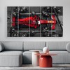 RileyCraftley Pit Stop Canvas Wall Art – Overhead Racing Car