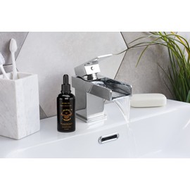 Black N Manly Beard Oil, with Leak proof top and a Fresh Cologne Scent, with Biotin and Collagen. Our products are to Soften and moisturizes using All Natural ingredients 2 oz glass bottle By C-Lim