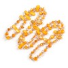 Avalaya Long Orange Melon Shell Nugget and Faceted Glass Bead