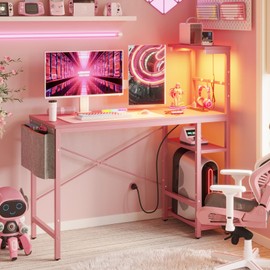 Bestier Pink Gaming Desk with Power Outlets, 44 Inch Led Gamer Desk with 4 Tiers Reversible Shelves, Pink Computer Desk with Headset Hook & Side Storage Bag for Bedroom (Pink 3D Carbon Fiber)