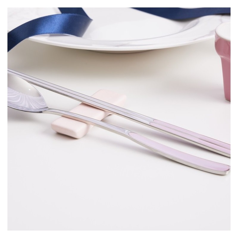 Pristine pastel-colored premium quality domestic cutlery set with good grip,