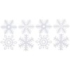 Formas de copo de nieve con purpurina iridiscente blanca –