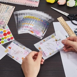 CREATCABIN 100Pcs Stars Cellophane Bags Clear Cookie Bags Self Sealing Individual Treat Bags Plastic Sleeves Self Adhesive Wrappers Resealable Candy Bag for Prints Photos Cards Envelope 3x4Inch