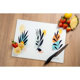 Tempered Glass Cutting Board - 15.75 x 11.81 in. Perfect for kitchen and serving. Resistant to stains, scratches, heat, and shattering. Enhance your culinary space with this plants inspired design