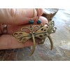 Bronze vintage dragonfly and turquoise wood rondl. Bronze vintage earrings