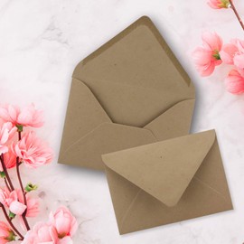 C7 envelopes, pointed flap, wet glue.