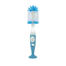 Nuby Cepillo dispensador de cerdas suaves y duraderas con asas texturizadas y base de succión, sistema 2 en 1, color azul