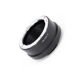 Pro Lens Adapter for use with Olympus OM lenses. Compatible with Canon EOS R Cameras (RF Mount)..