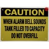 CAUTION WHEN ALARM BELL SOUNDS TANK FILLED TO CAPACITY DO