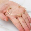 Philip Jones Gold Plated Love Knot Cuff Bangle