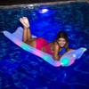 The Inflatable Pillow Pool Raft with Illuminated LED - A Unique and Fun Way to Lounge in The Pool, by PoolCandy. Enjoy a Comfortable and Relaxing Lounging Experience with The Glow of The LED Lights.