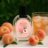 Peach Oolong |A sip of iced peach oolong on a
