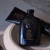 Signature Shampoo by Oribe for Unisex - 2.5 oz Shampoo