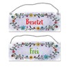 Grey toilet is free or occupied reversible sign with flower