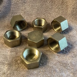 Unbranded 7— 1-1/4” HEX CAPS FNPT…Zinc Plated….NEW