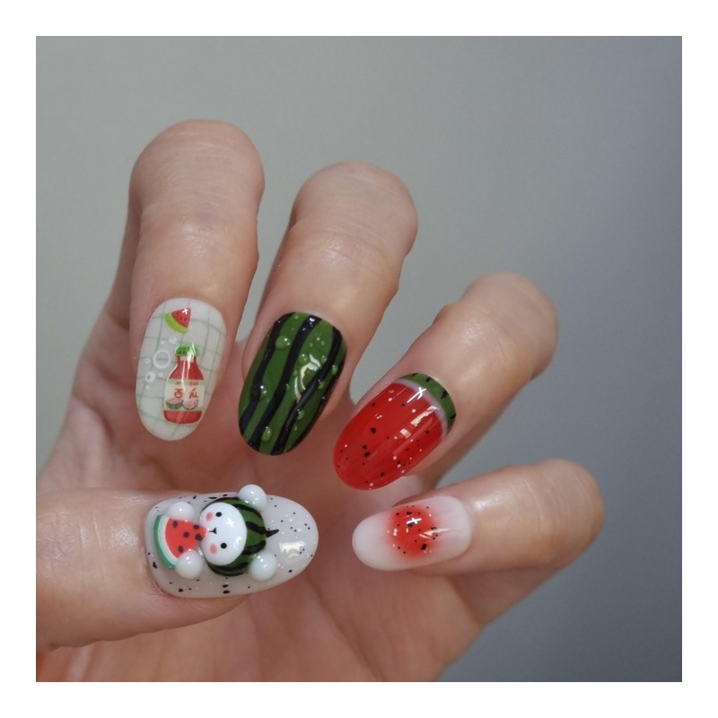 Handmade nail tip for a bear missing a watermelon in