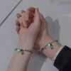 Pulsera Parejas Imán Astronauta Brilla Oscuridad Gris Ajustable AKELIN