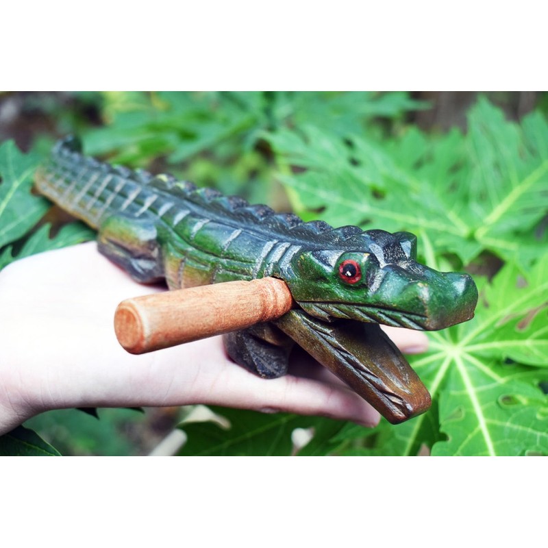Guiro music percussion instruments wooden sound block animal croaking Alligator