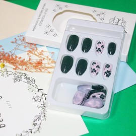 St. Patrick's Day Press on Nails Medium Oval Fake Nails Green False Nails with Glitter Shamrock Clover Designs Nude Artificial Full Cover Almond Nails Irish Glue on Nails for Women and Girls 24 Pcs