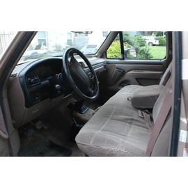 Durafit Seat Covers, Made to fit 1992-1997 F150-F350 Regular and XCab Front Solid Bench Seat with Adjustable Headrests and Integrated Center Armrest with Drink Tray. Made in Dark Gray Twill